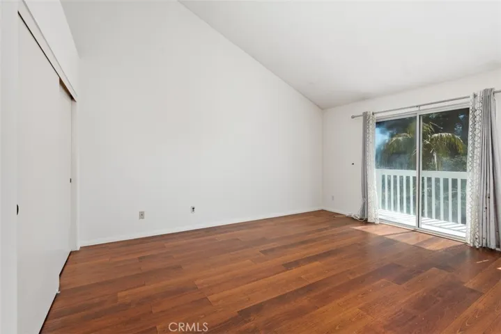 Primary Bedroom with Balcony & Views