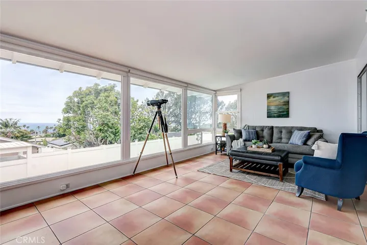 View of sunroom facing the right side of the backyard
