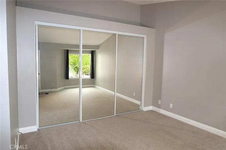 Closet in primary bedroom