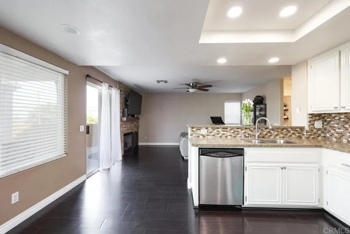 Bar Top to the right above the dishwasher; Breakfast Nook area in Kitchen