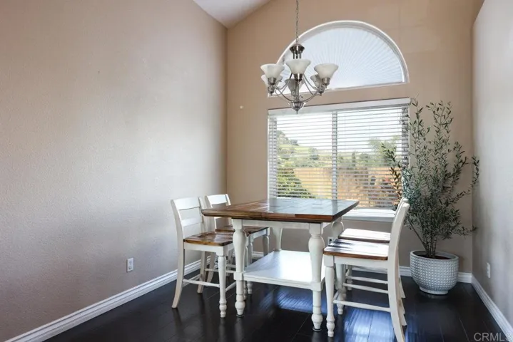 One entrance into the Kitchen is located to the right of the Dining Room
