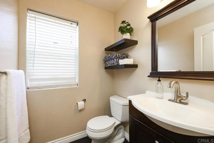 Half-Bath downstairs between the Living Room and 2-Car Garage