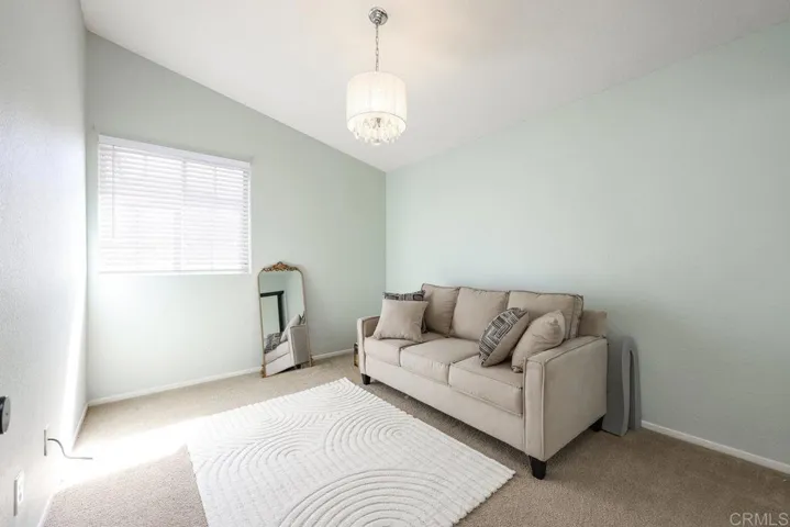 First Bedroom to the right at the top of the stairs - used as an office, too