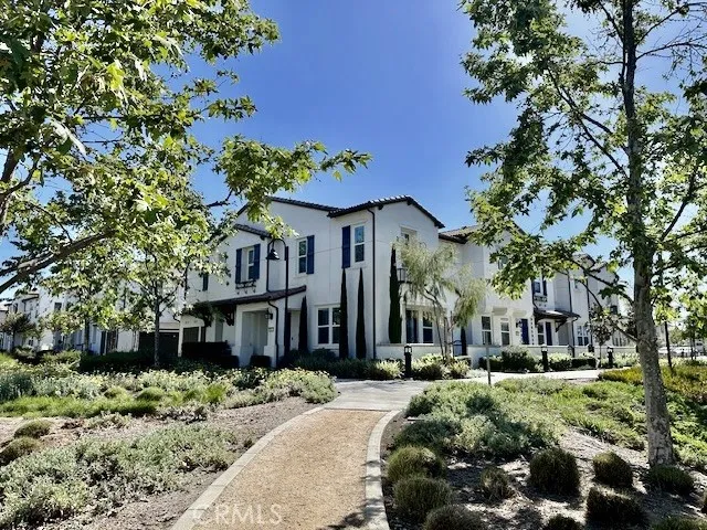 Corner view of the property, with walking trail right outside.