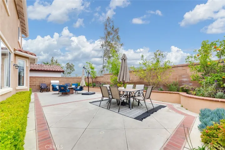 Private Backyard with Blockwall Fence. Patio Furniture and BBQ Included.