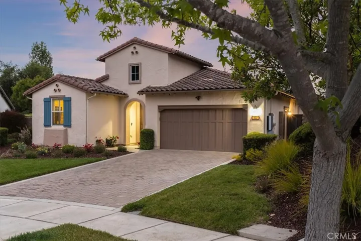 Long paver driveway.