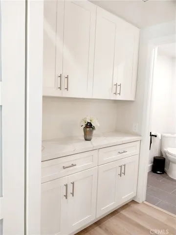 Upper linen and counter. Opposite vanity