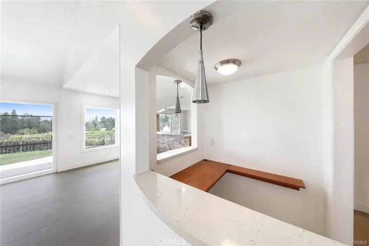 custom bar area open to dining room and great room