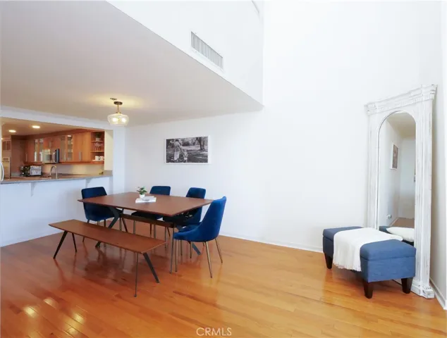 Kitchen Opens to Dining and Living Area with a Breakfast Bar