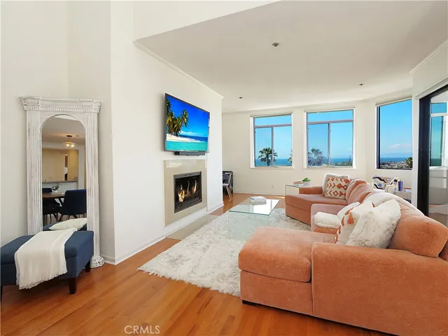 Living Room with Wood Burning Fireplace and Sweeping Views