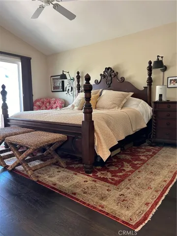 Primary bedroom with sliders to backyard jacuzzie