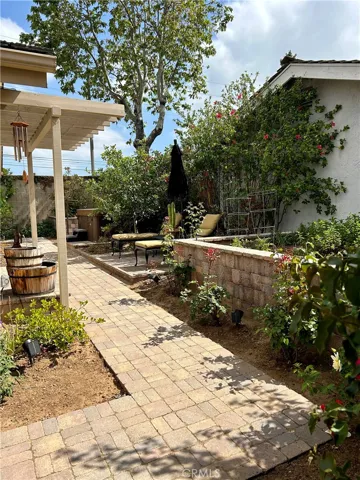 Side yard of of Primary bedroom with garden bed