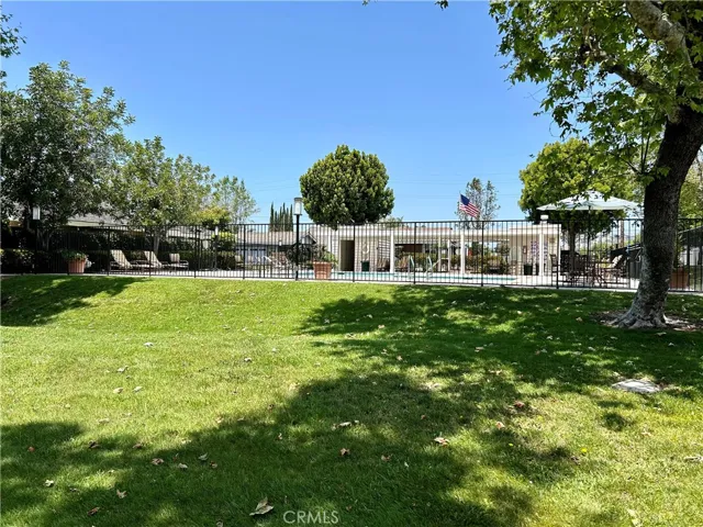 Pool grass area with sidewalks