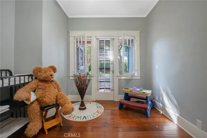 Second Bedroom with access and views of the large backyard