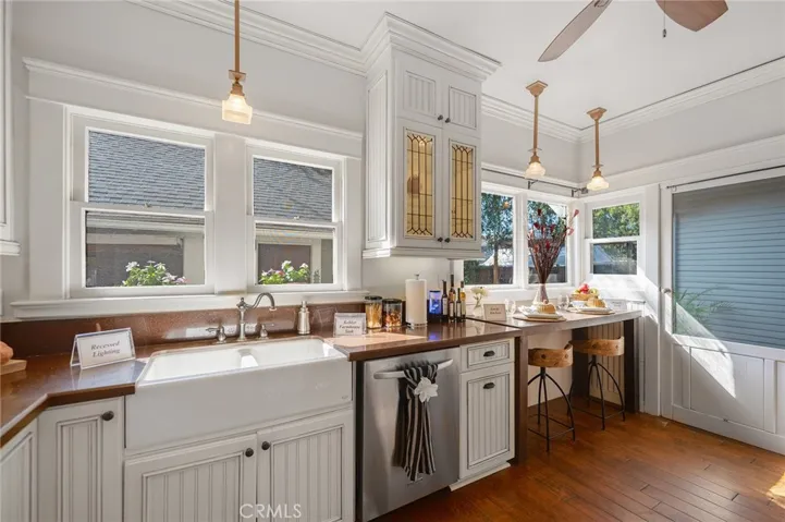 Neutral open Kitchen with views of backyard