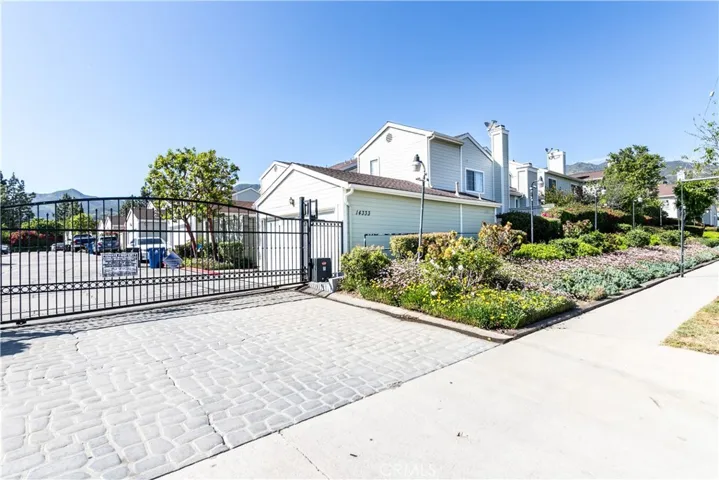 1st property upon entering automatic gate. West enterance.