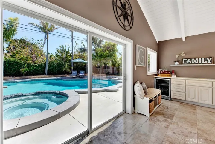 2 Sets of Sliding Glass Doors Open to the Resort Backyard