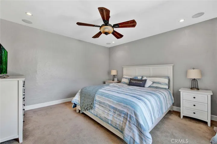 Downstairs Master Bedroom with Slider Opening to Backyard