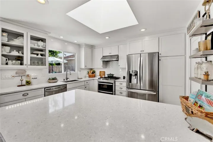 Quartz Counters, Skylight, Custom Cabinetry, Walk-In Pantry