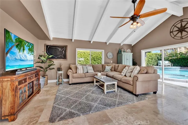 Open Beam Cathedral Ceiling & Travertine Flooring