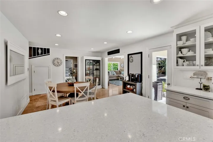 Kitchen Open to Spacious Dining Room with Recessed Lighting