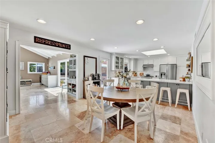 Sun-Drenched Spacious Dining Room is Open to Kitchen and Family Room