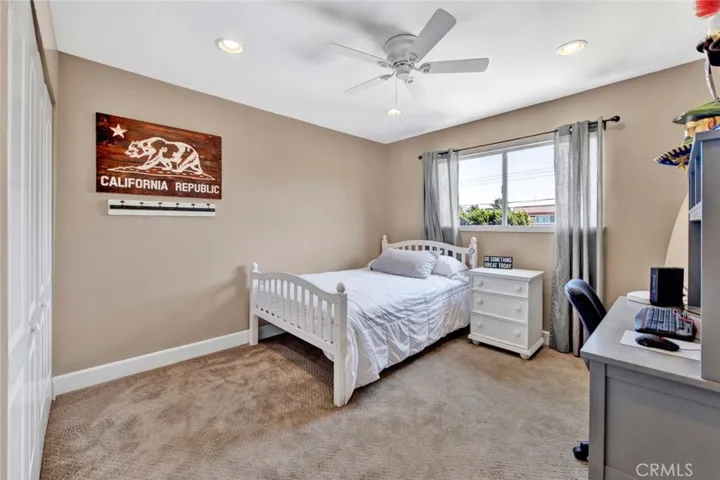 Bedroom #4 Upstairs with Recessed Lighting, Ceiling Fan, and Custom Organized Closet