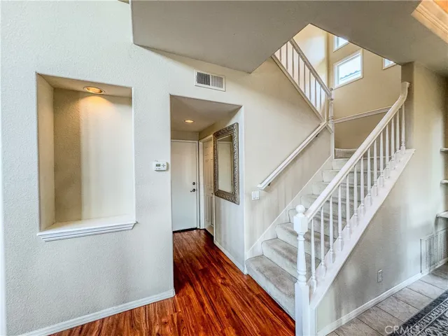 Vestibule to garage, 1/2 bath, and laundry room