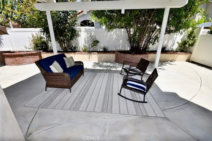 Relax in the shade  under the pergola.