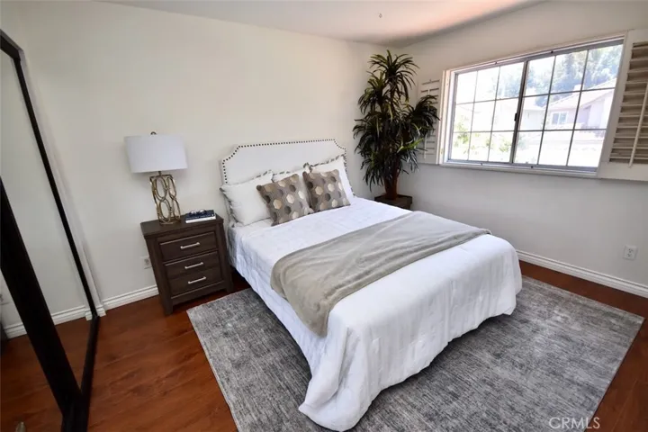 3rd Bedroom with mirrored wardrobe.
