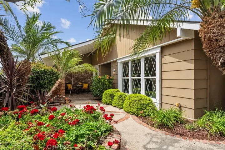 Imagine coming home to this charming front patio