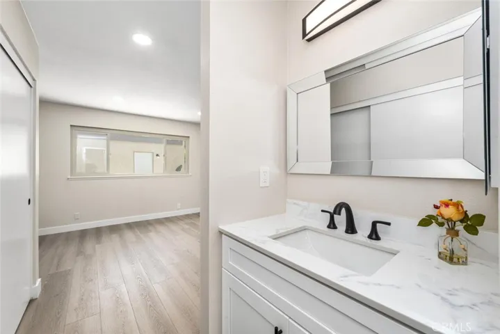 Additional private vanity area in primary bedroom.
