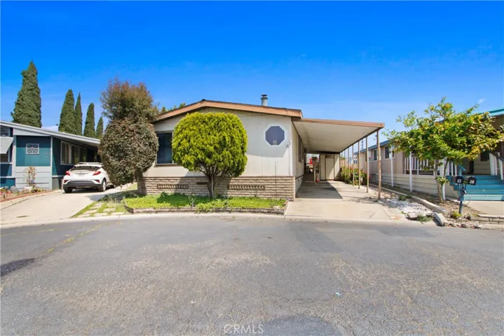 Street end view of this unit to include the carport.