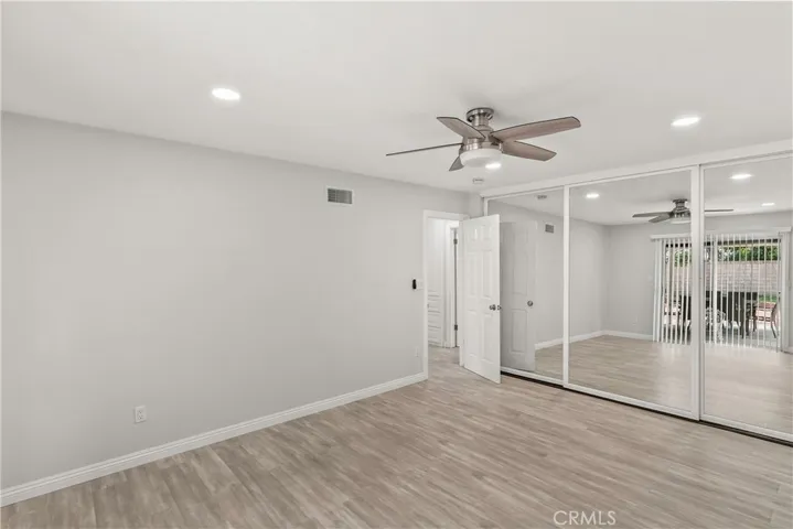 2nd room Double Mirrored closet, CCan Lights, Ceiling Fan, Laminate wood type flooring