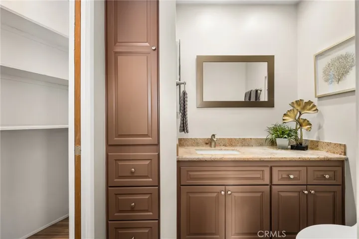 Half bath with storage area in the family room
