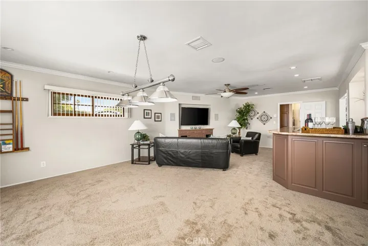A view from the missing pool table to the rest of the family room