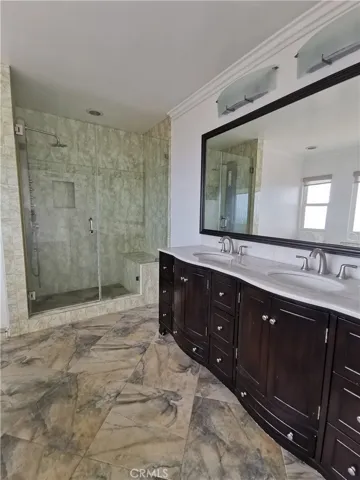 Bathroom in master bedroom view