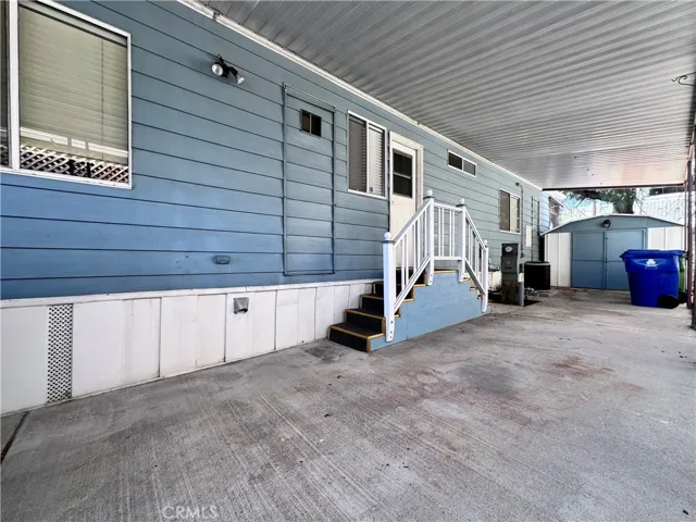 Carport Entrance + Shed