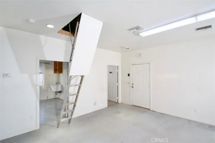 HUGE finished garage with attic storage, "laundry room" and bathroom