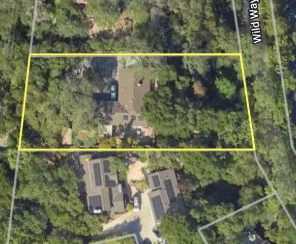 Expansive lot with large flat, buildable area in lower portion with access from Wild Way.  ADU ready