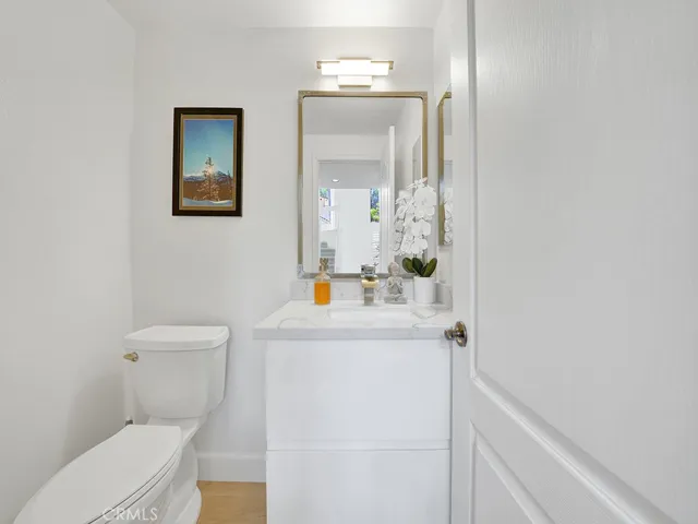 The downstairs half bathroom is also remodeled.