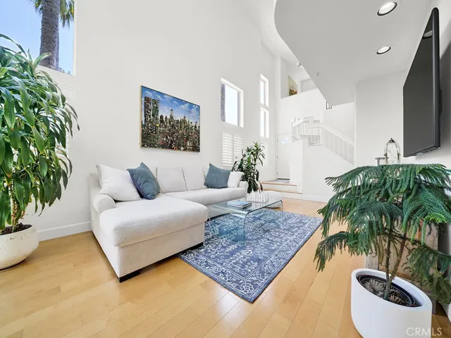 Notice the vaulted ceilings and windows that make this unit light and bright.