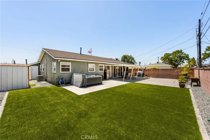 Artificial turf is low maintenance and great as a play area.
