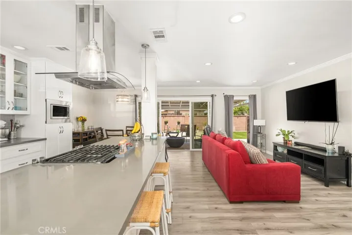 View of the Kitchen and Family room towards the backyard.