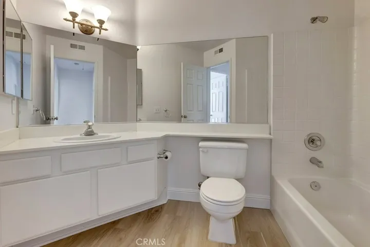 Upstairs Hall Bathroom with New Paint & Luxury Waterproof Vinyl Flooring
