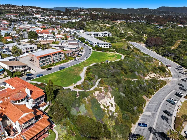 The alternative beach access point is from the neighborhood park and has concrete  path/stairs