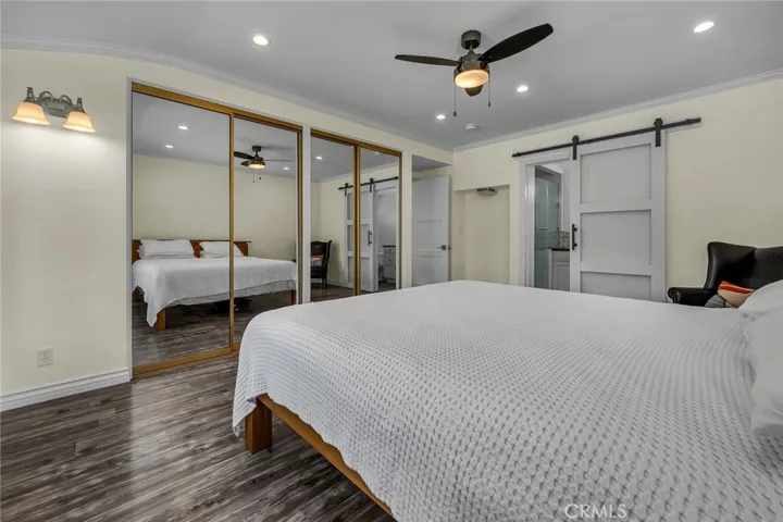 Barn door from bedroom to bathroom.