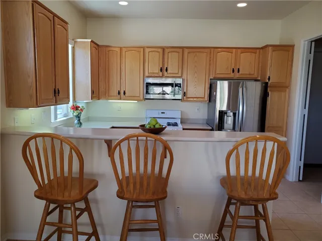 counter area with chairs