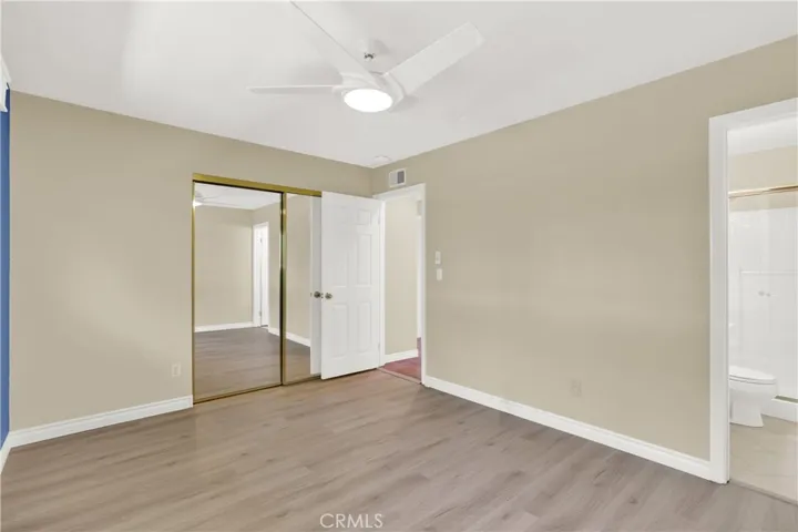 Secondary with mirrored wardrobe
