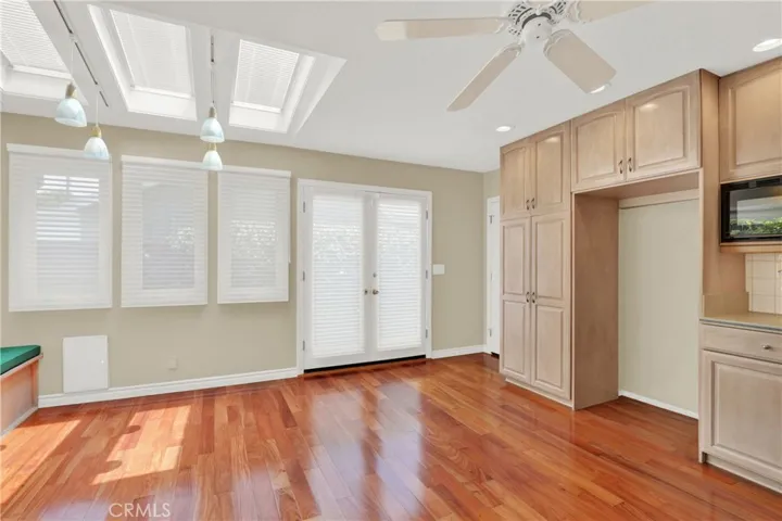 Dining area showered with natural light from the 3 skylights
